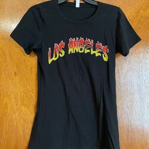 S & A black short sleeve t-shirt. Size: Medium. NEW: never worn without tags